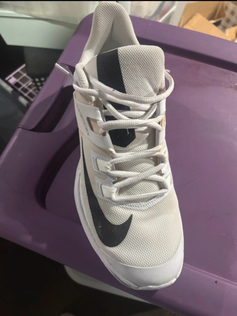 Nike Women’s White Athletic Shoe with Black Swoosh and Black Tongue Accent
